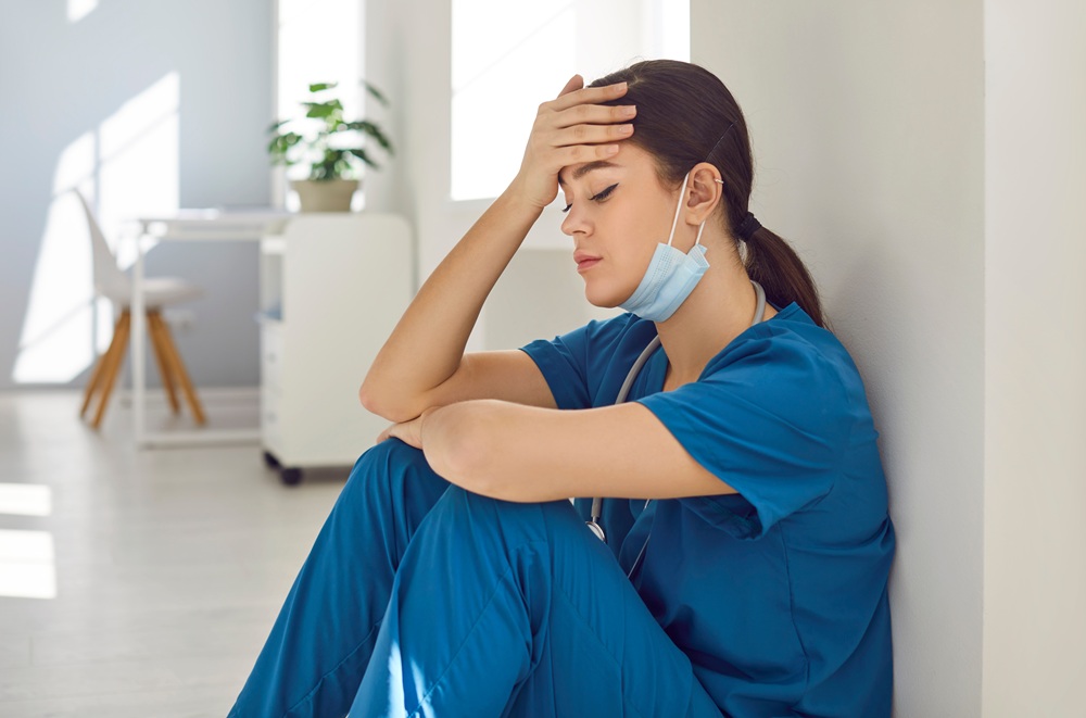 Tired,And,Sad,Woman,Doctor,,Experiencing,Stress,,Burnout,Or,The